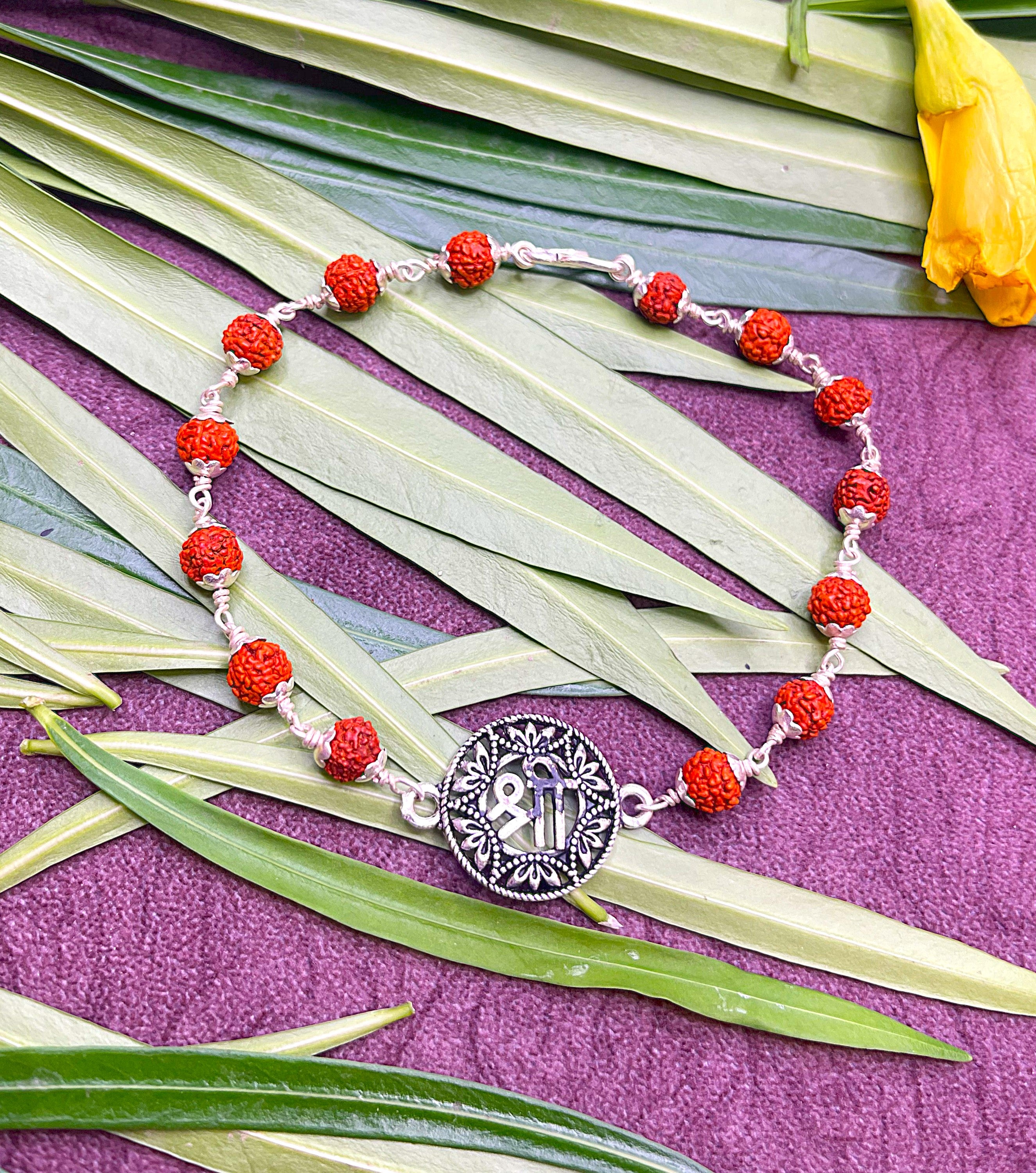 Rudraksha Bracelet with Om Engraved Silver Charm