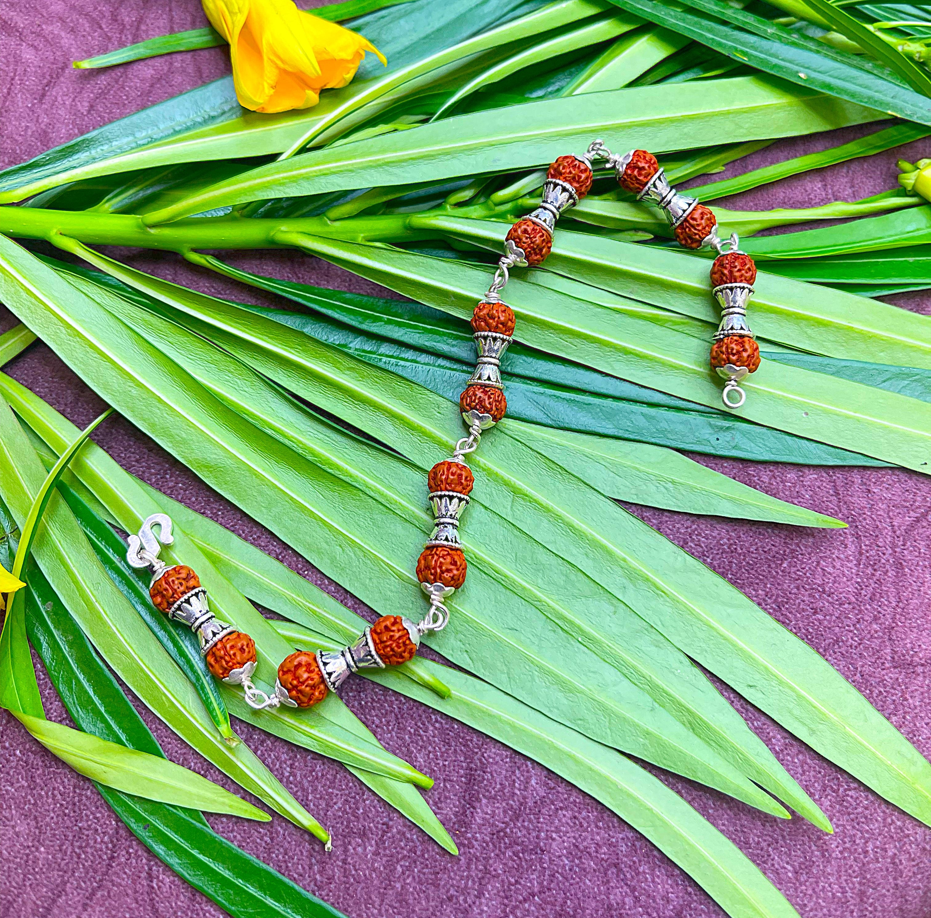 Rudraksha Bracelet with Antique Silver Damru Beads