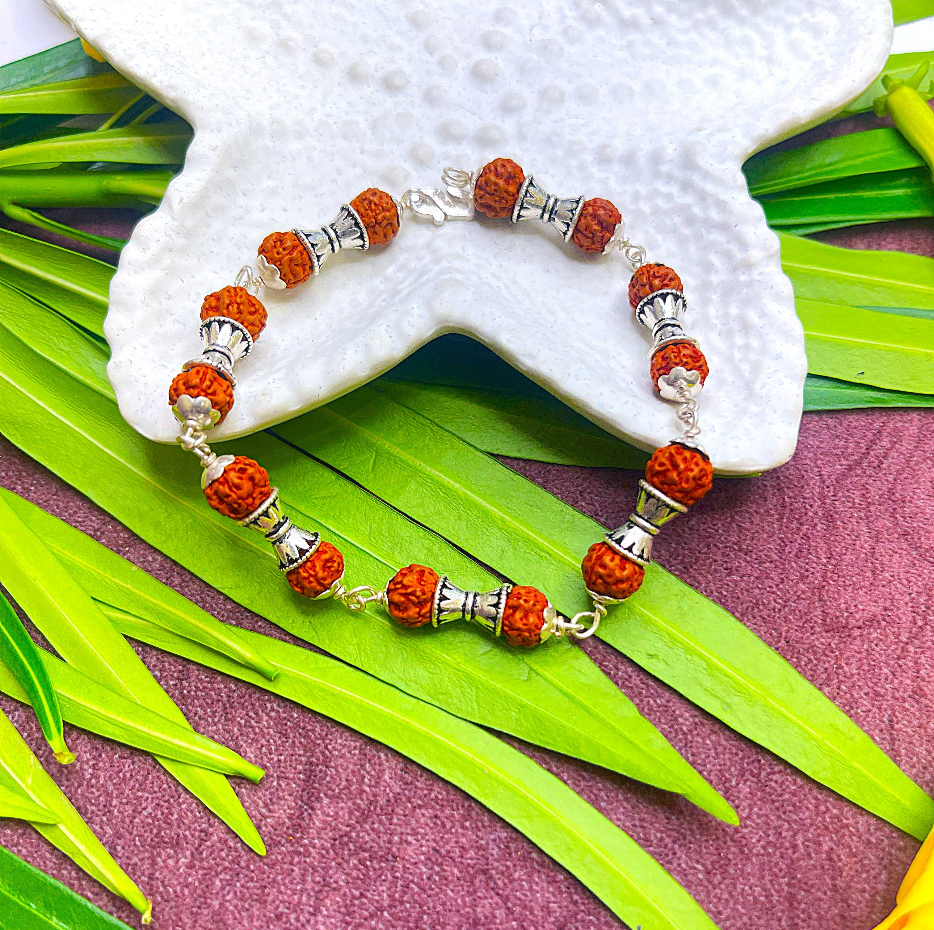 Rudraksha Bracelet with Antique Silver Damru Beads